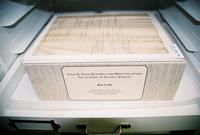 An archival storage box for a Peale Box